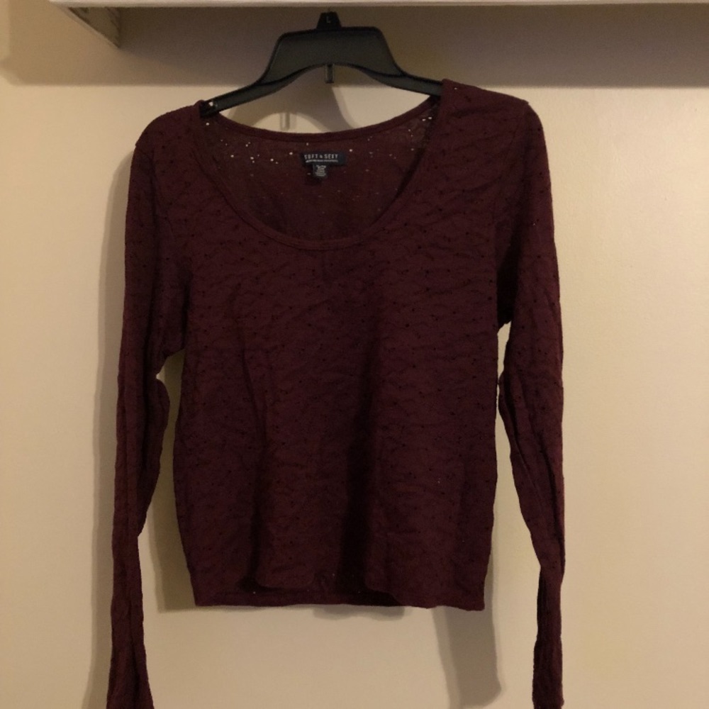 A maroon laced shirt